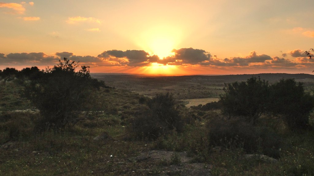 Sunset over landscape nearby