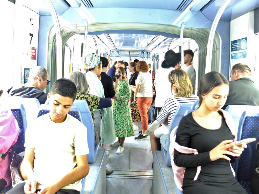 photo on bus, showing passengers